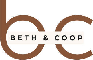 Elegant minimalist logo featuring the names 'beth & coop' intertwined with a sophisticated ampersand, set against a plain background, symbolizing inclusion for a children's book about disabilities.