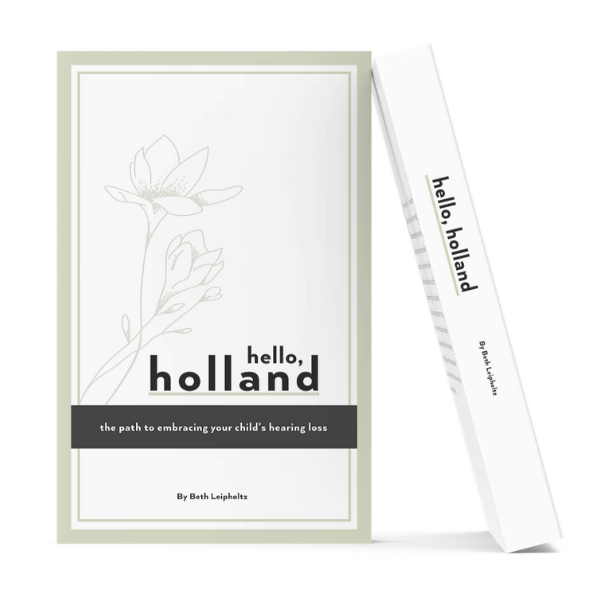 Front and spine view of the book 'Hello, Holland' by Beth Leipholtz. The cover, reminiscent of a children's book about equality, features a minimalistic flower illustration and the subtitle, 'the path to embracing your child’s hearing loss.'.